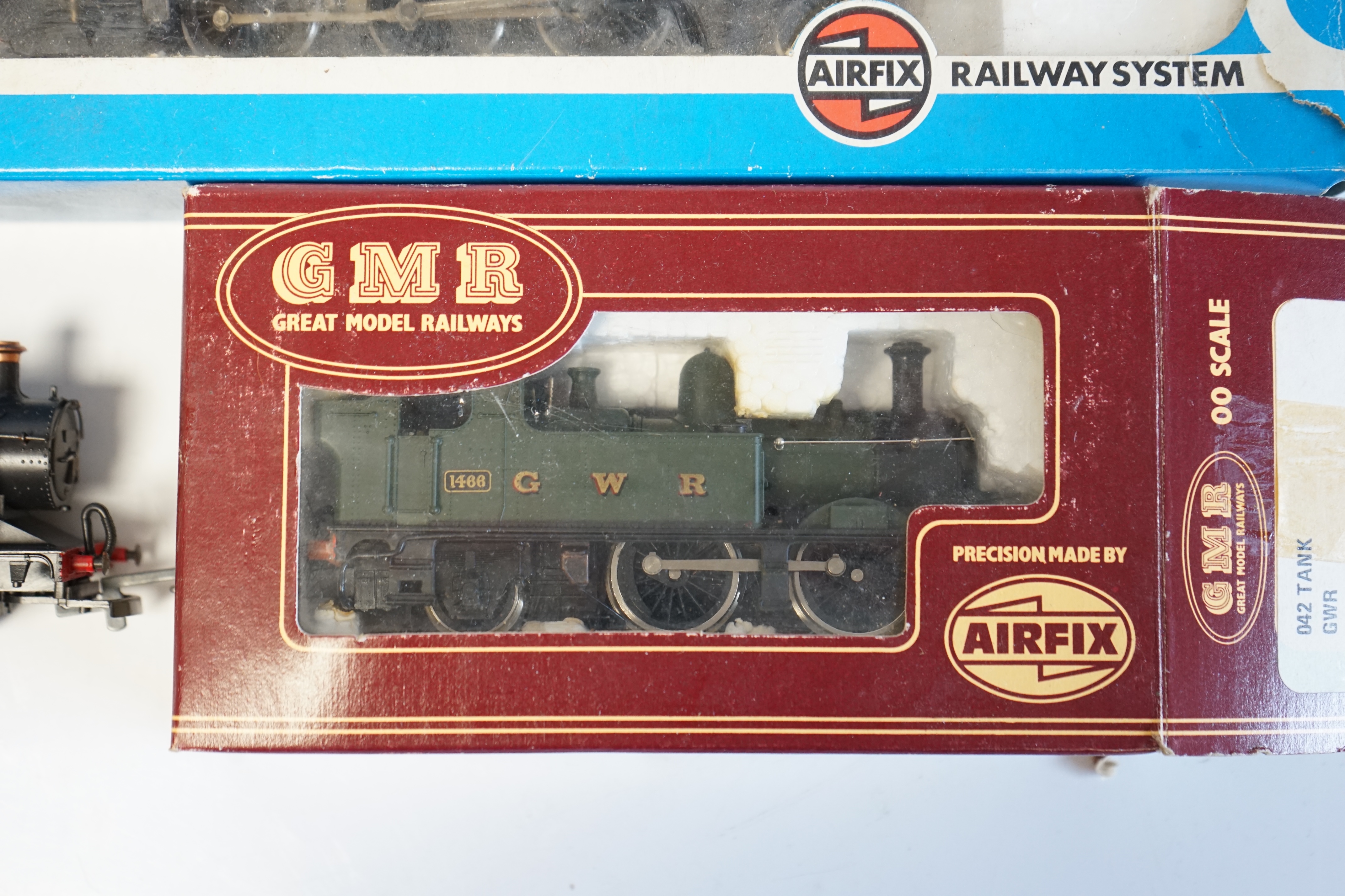 Three 00 gauge GWR steam locomotives by Lima and Airfix; a Prairie Tank locomotive, 6110, a Class 94xx loco and a Class 14xx. Condition - fair, two locos boxed